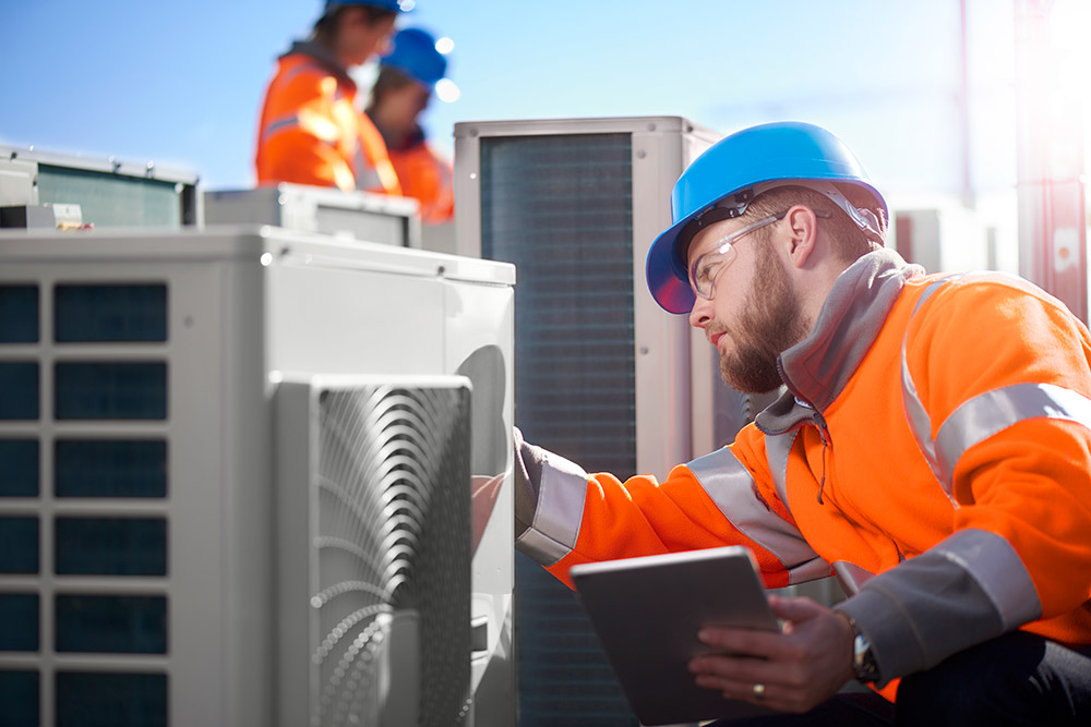 maintenance hvac roof repair workers