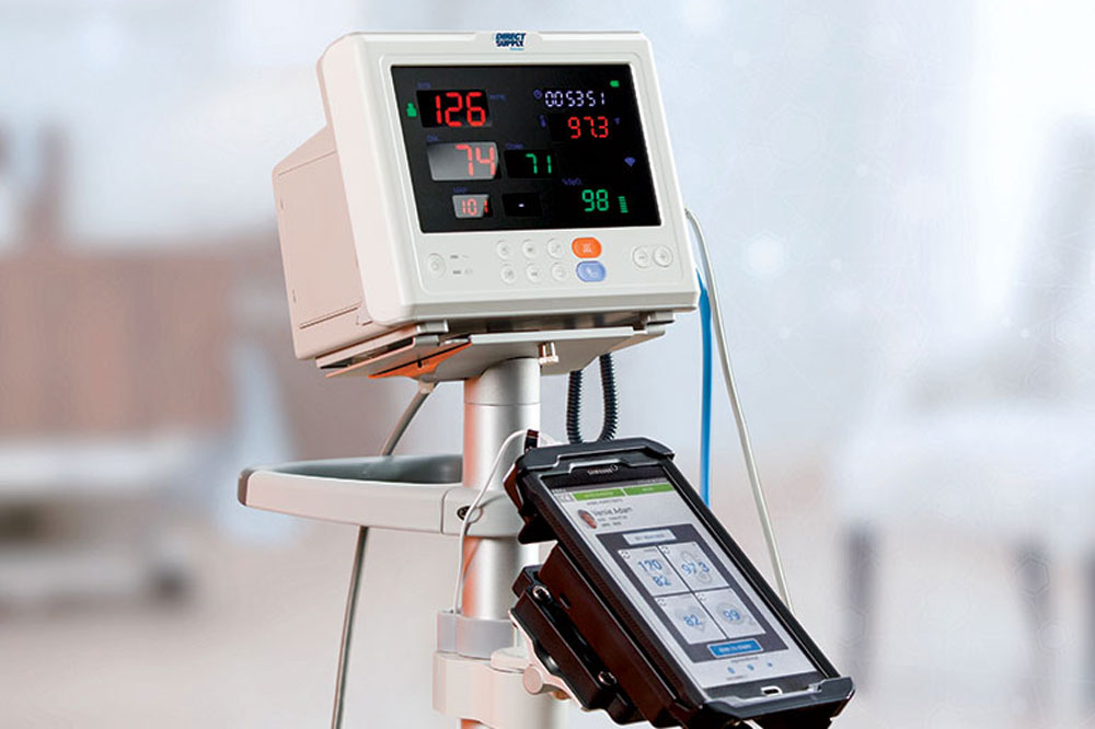 photo of vital signs monitor in a healthcare setting