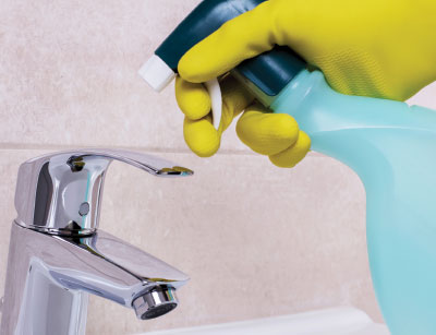 Rinsing disinfectants off surfaces using a spray bottle