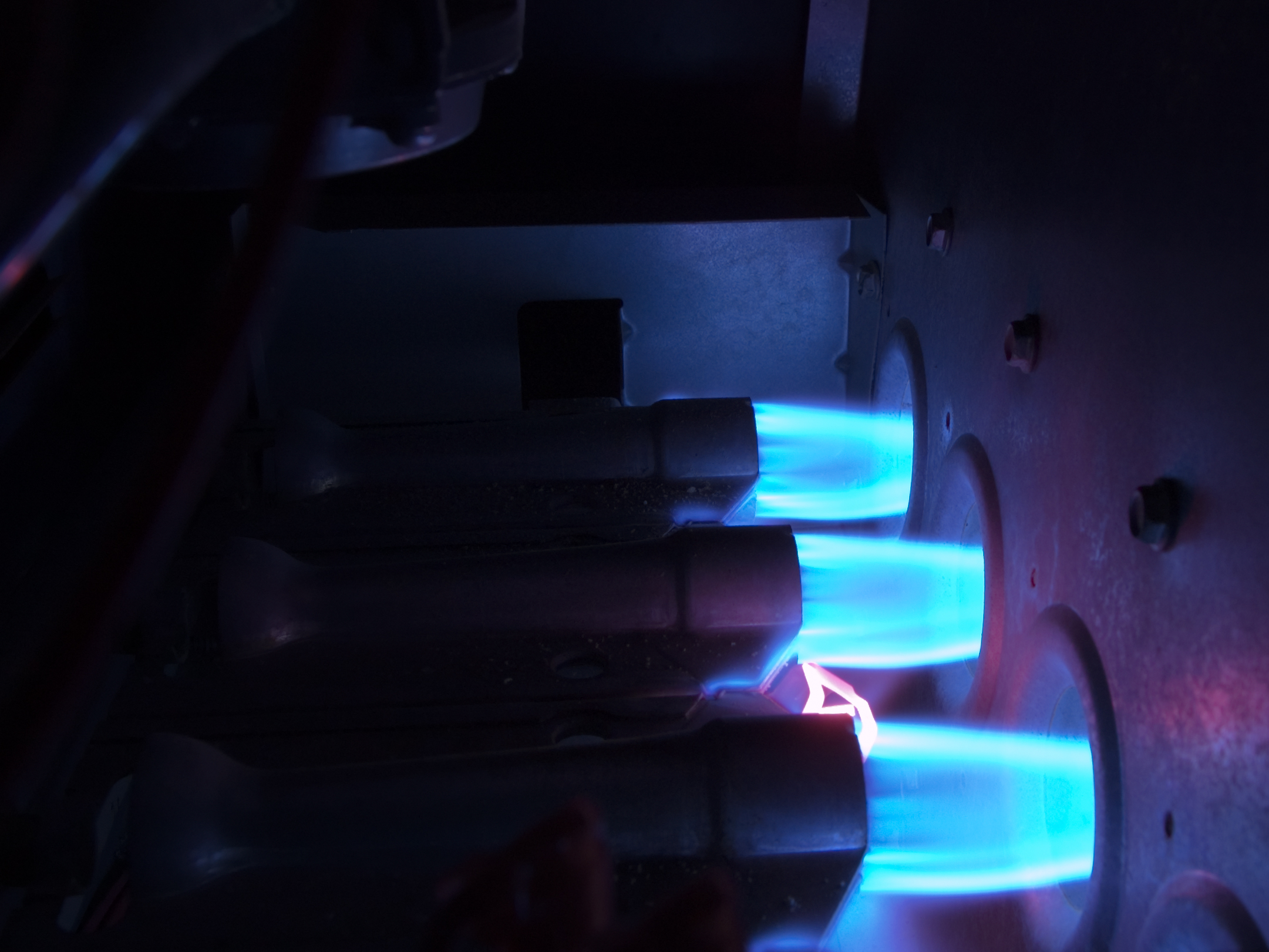 Inside a Natural Gas Furnace Three natural gas burners for fall maintenance checklist