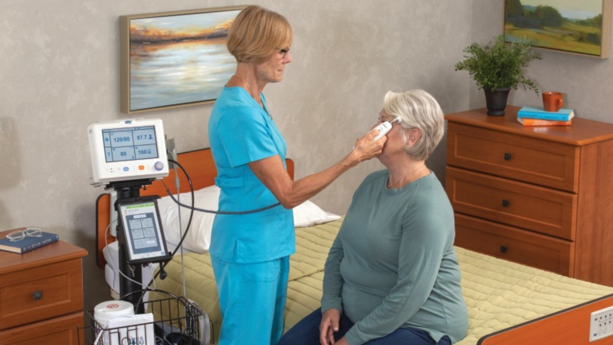 DS smart technology brings EMR connectivity as a caregiver takes vitals.