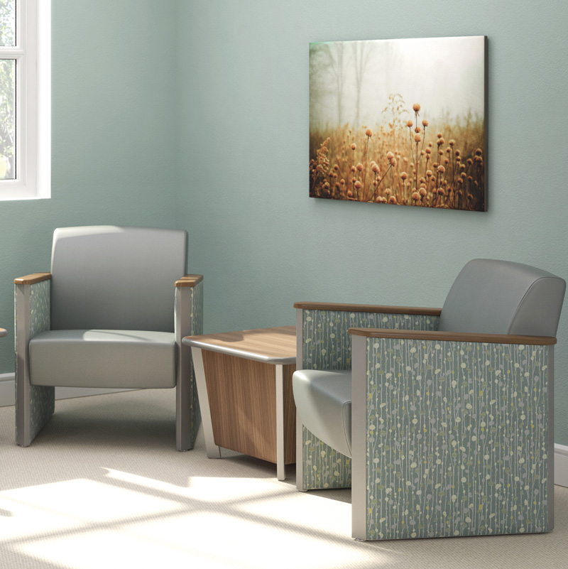 two chairs and an end table in a waiting room