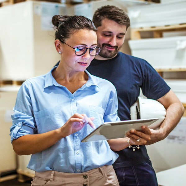 Two People looking at tablet